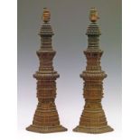 Pair of late 19th/early 20th Century Indian carved lamp bases, each in the form of an