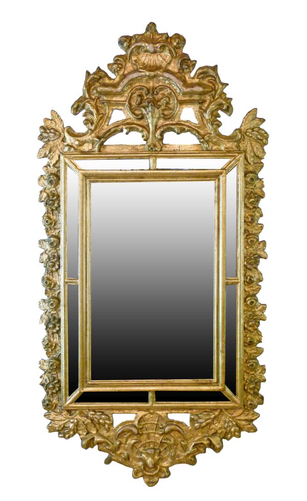 Antique Italian giltwood and gesso wall mirror, the plate with eight conforming surrounding mirrored