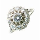 Eleven stone diamond 18ct white gold cluster ring, London 1974, the brilliant cuts totalling