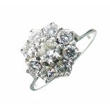 Nine stone diamond 18ct white gold ring, the brilliant cuts totalling approximately 1.3 carats, size