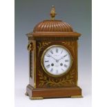 Early 20th Century Regency style brass inlaid mahogany mantel clock having a pineapple finial,