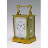 Large French brass cased repeat carriage clock, white enamel dial with Roman numerals and subsidiary