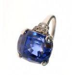 Sapphire and diamond ring, stamped 'Plat', the possibly Ceylon native cut sapphire measuring 12.