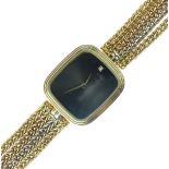Omega - Lady's 18ct gold quartz bracelet watch, the plain bronze coloured rounded rectangular dial