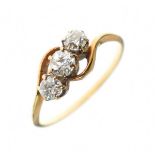 Three stone diamond ring, the graduated old brilliant cuts totalling approximately 0.5 carats,