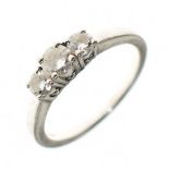 Three stone diamond platinum ring, the graduated brilliant cuts totalling approximately 0.55 carats,