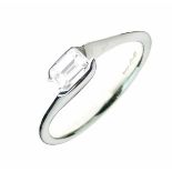 Single stone diamond set platinum ring, the step cut estimated as weighing approximately 0.4 carats,