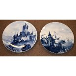 Pair of 20th Century Continental Delft style chargers, each having blue and white decoration, the
