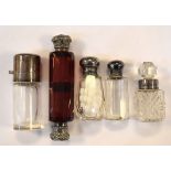 Silver mounted ruby glass double ended scent bottle and four other silver mounted scent/smelling