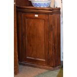 Early 20th Century mahogany wall hanging corner cabinet fitted blind panel door Condition: