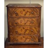 Figured walnut veneered table top chest of four drawers fitted brass handles Condition: