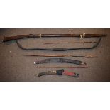 Ethnographica - Wooden bow, spear, arrows and a primitively constructed 'Duck' gun etc Condition: