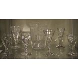 Various glass comprising: four drams, two wines and a large beaker with engraved foliate