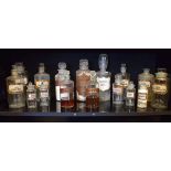 Quantity of clear glass apothecary bottles Condition: