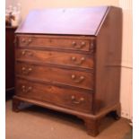 Georgian mahogany bureau fitted fall flap above four long drawers on bracket feet Condition: