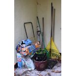 Quantity of garden tools, roller, parasol base etc Condition: