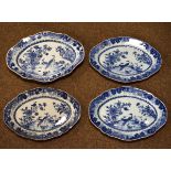 Four 19th Century Nanking oval meat dishes, each having blue and white painted decoration