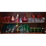 Quantity of cranberry and green glass wines etc (two shelves) Condition: