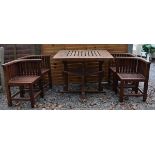 Heal's square top teak garden table with four en-suite corner chairs designed to fit beneath the