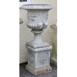 Large 'stone' classical design urn and pedestal Condition: