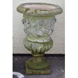 Large 'stone' garden urn with vine and leaf decoration Condition: