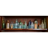 Quantity of vintage glass and salt glazed pottery bottles, apothecary bottles etc Condition: