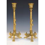 Pair of late 19th/early 20th Century ormolu candlesticks, probably French, each having a tapered