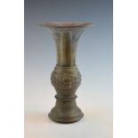 Chinese bronze Gu vase, the centre band decorated with the eight Daoist Trigrams, the underside with