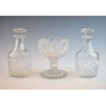 Pair of good quality cut glass decanters and a heavily cut glass bowl on a star cut foot Condition: