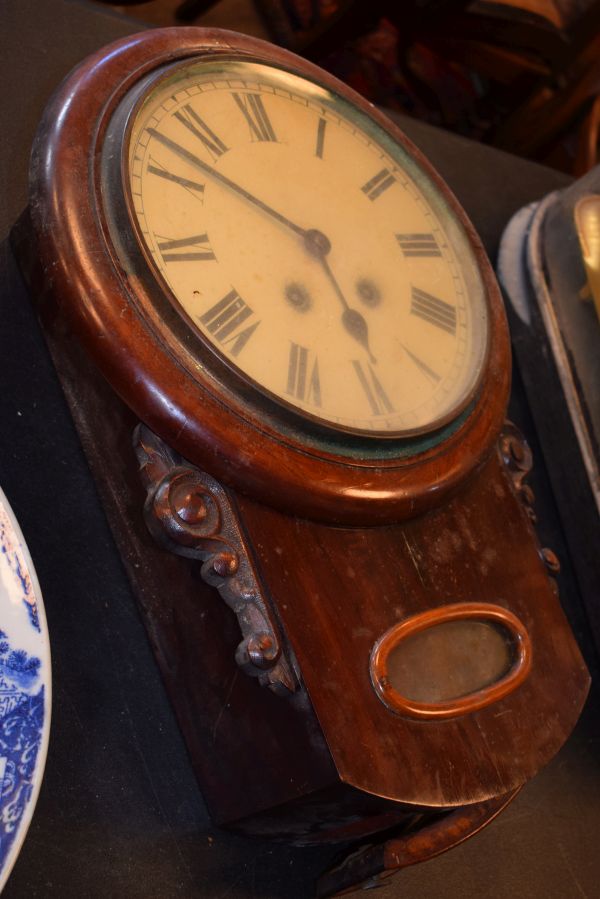 19th Century mahogany drop dial wall clock, the white dial having Roman numerals Condition: