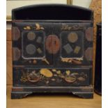 Late 19th/early 20th Century Oriental lacquered table top cabinet fitted two doors with drawer below