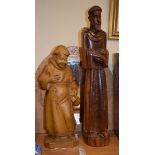 Two 20th Century carved wooden figures of monks Condition: