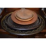 Papier-mâché oval tray, together with another oval tray, turned wooden bowls etc Condition: