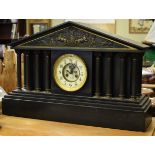 Late Victorian black slate architectural style mantel clock, the dial inscribed Benetfink & Co,