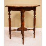 Late Victorian walnut circular shaped top centre table, raised on turned supports united by