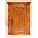 19th Century oak wall hanging corner cabinet having blind panel door Condition: