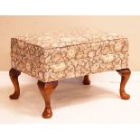 Parker Knoll rectangular footstool, raised on four cabriole supports having woven floral green