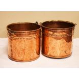 Pair of copper coal buckets, each having a band of riveted decoration and with a brass swing