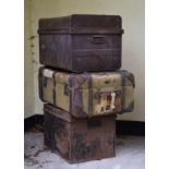 Two painted metal trunks and one other canvas and leather mounted trunk Condition: