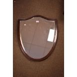 Early 20th Century mahogany and string inlaid framed shield shaped bevelled mirror Condition: