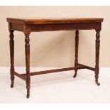 Late 19th/early 2th Century rectangular top side table, raised on turned supports united by