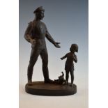 Russian cast iron figure group depicting a returning soldier greeting his daughter Condition: