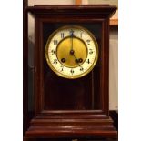 Early 20th Century stained beech cased mantel clock, the gilt dial having an off-white chapter