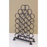 Late 20th Century wrought iron floor standing wine rack Condition: