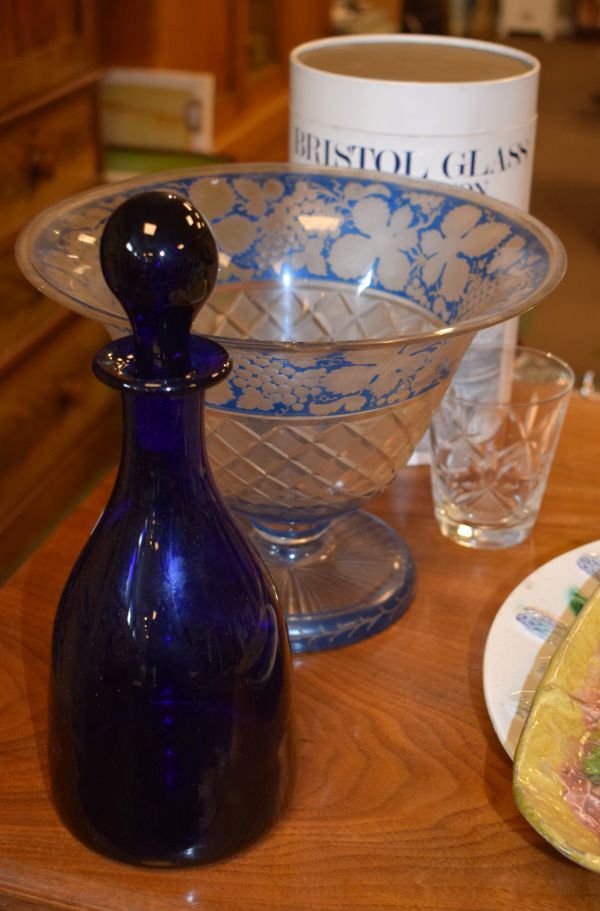 Thomas Webb mallet shaped blue glass decanter and a 19th Century blue glass bowl having engraved