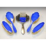 George V silver six piece dressing table set having engine turned and royal blue enamel