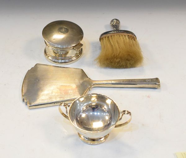 George VI silver two handled cup, Birmingham 1937, a circular silver dressing table requisite having