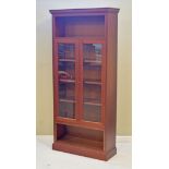 Mahogany bookcase fitted pair of glazed doors with open shelf above and below Condition: