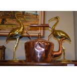 Copper kettle and a pair of brass flamingo ornaments Condition: