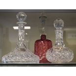 Two glass decanters, one having a silver Brandy label, the other with a silver plated Port label,